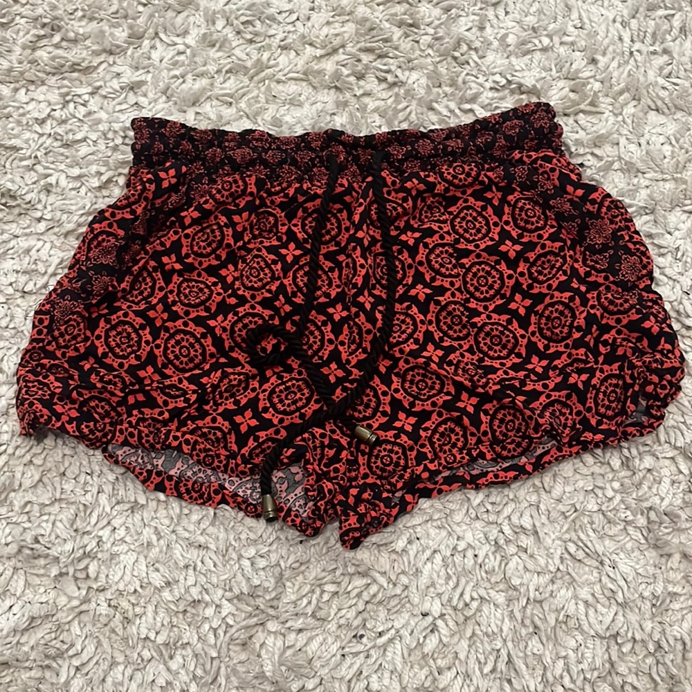 Orange/black shorts from rue21 with pockets size is girls L can fit size xs/s